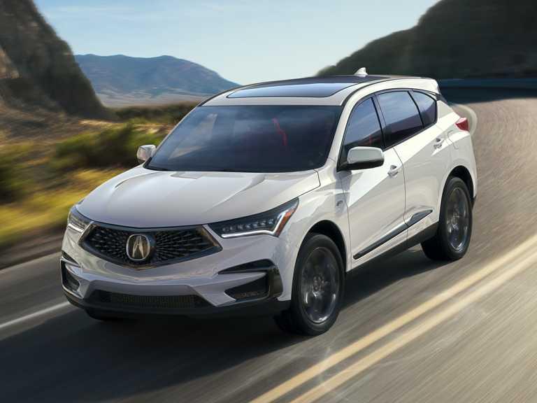 Acura DRX 2021 blanco en movimiento