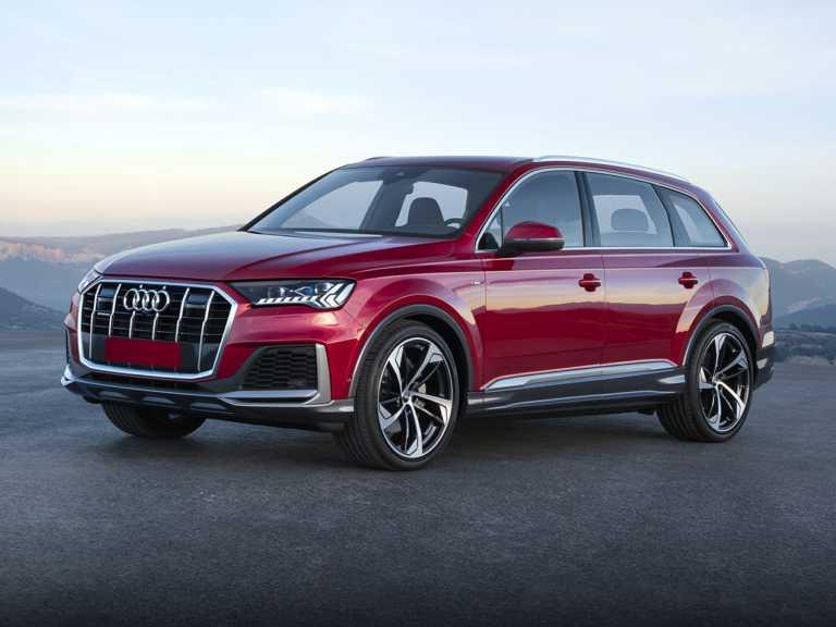 Audi Q2020 7 rojo desde el lado del conductor delantero