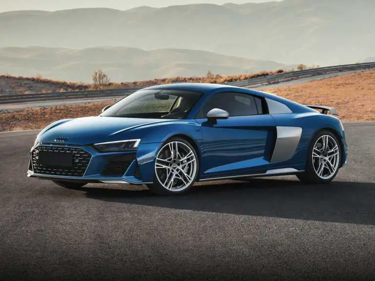 Audi R2020 8 azul desde el lado del conductor delantero