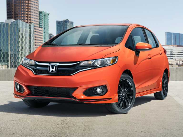 Honda 2020 naranja desde el lado del conductor delantero