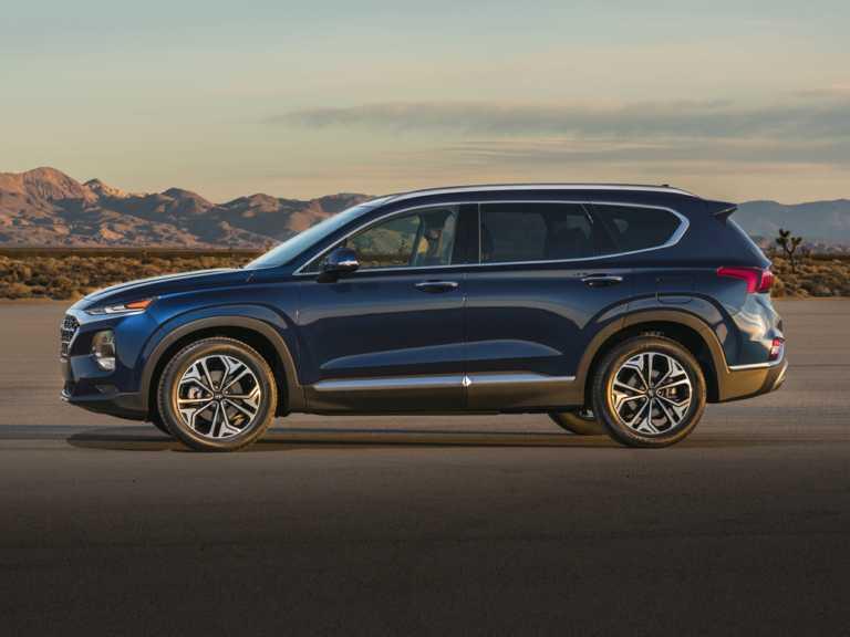 Hyundai Santa Fe 2019 azul desde el lado del conductor