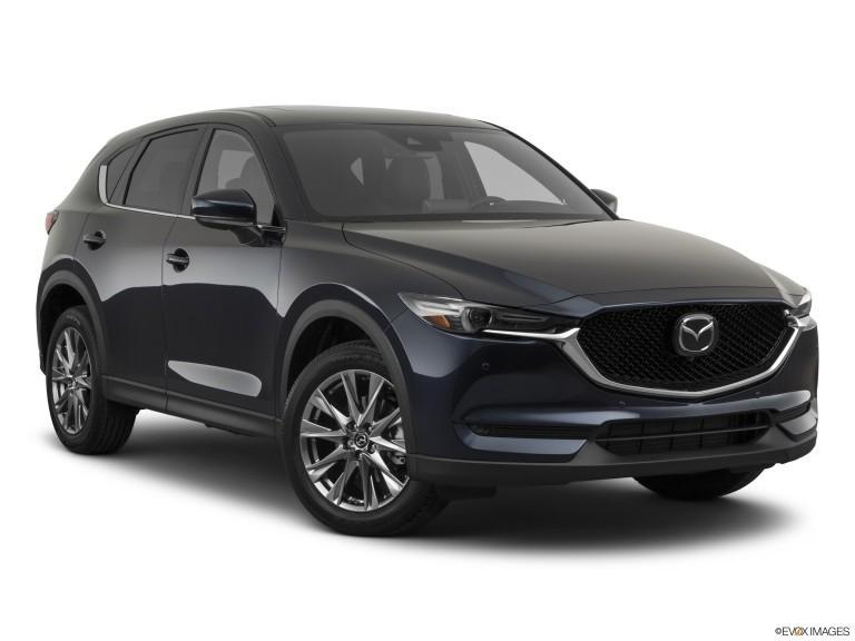 Mazda CX-2020 5 azul con fondo blanco